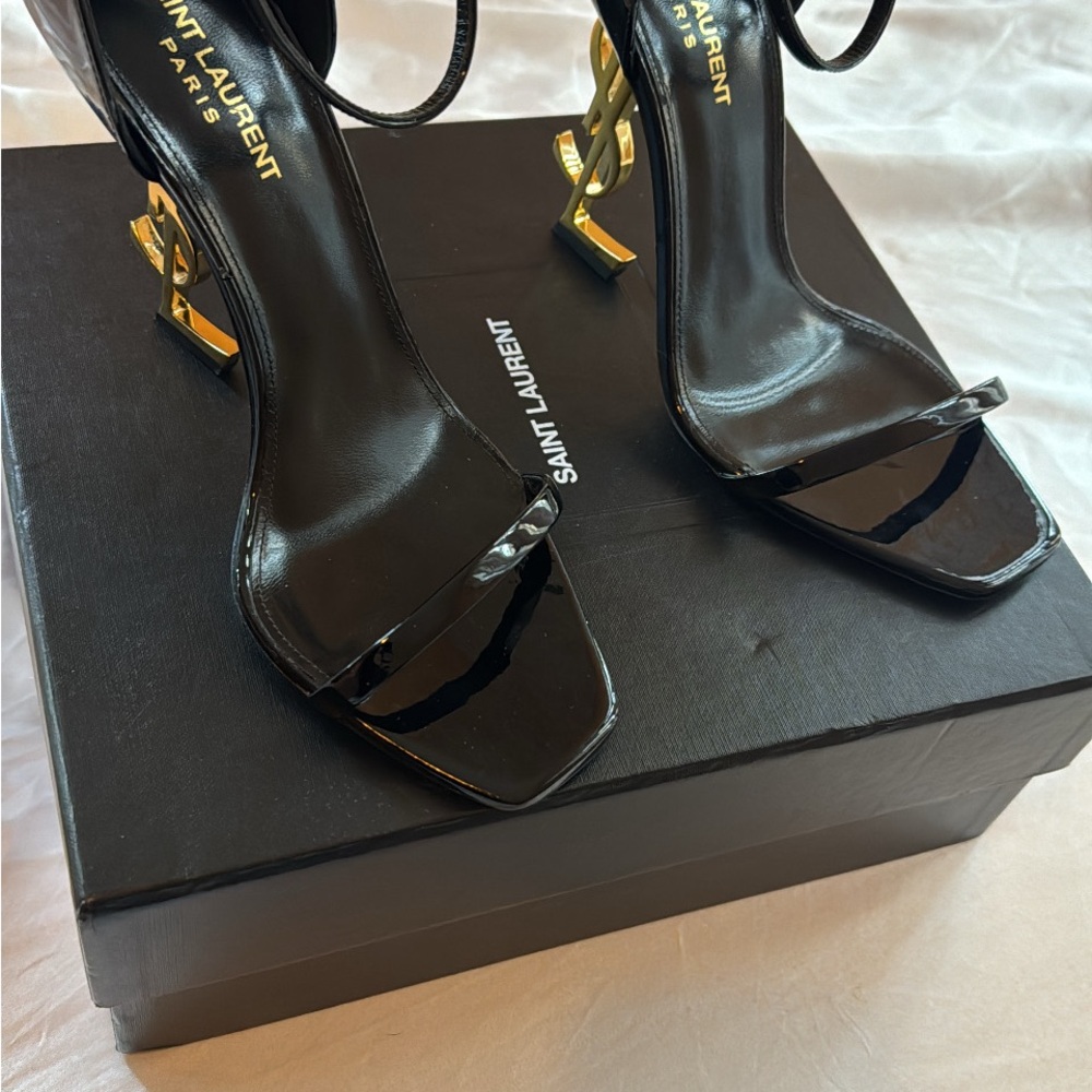 Yves Saint Laurent Black and Gold Heels